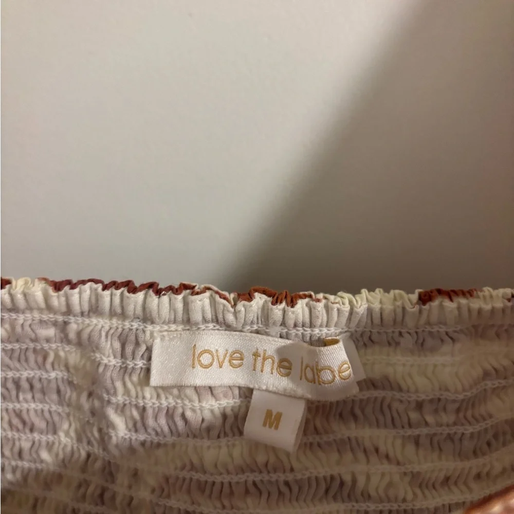 ANTHROPOLOGIE Love The Label Smocked Eyelet Puff Sleeve Blouse with Zebra Bodice